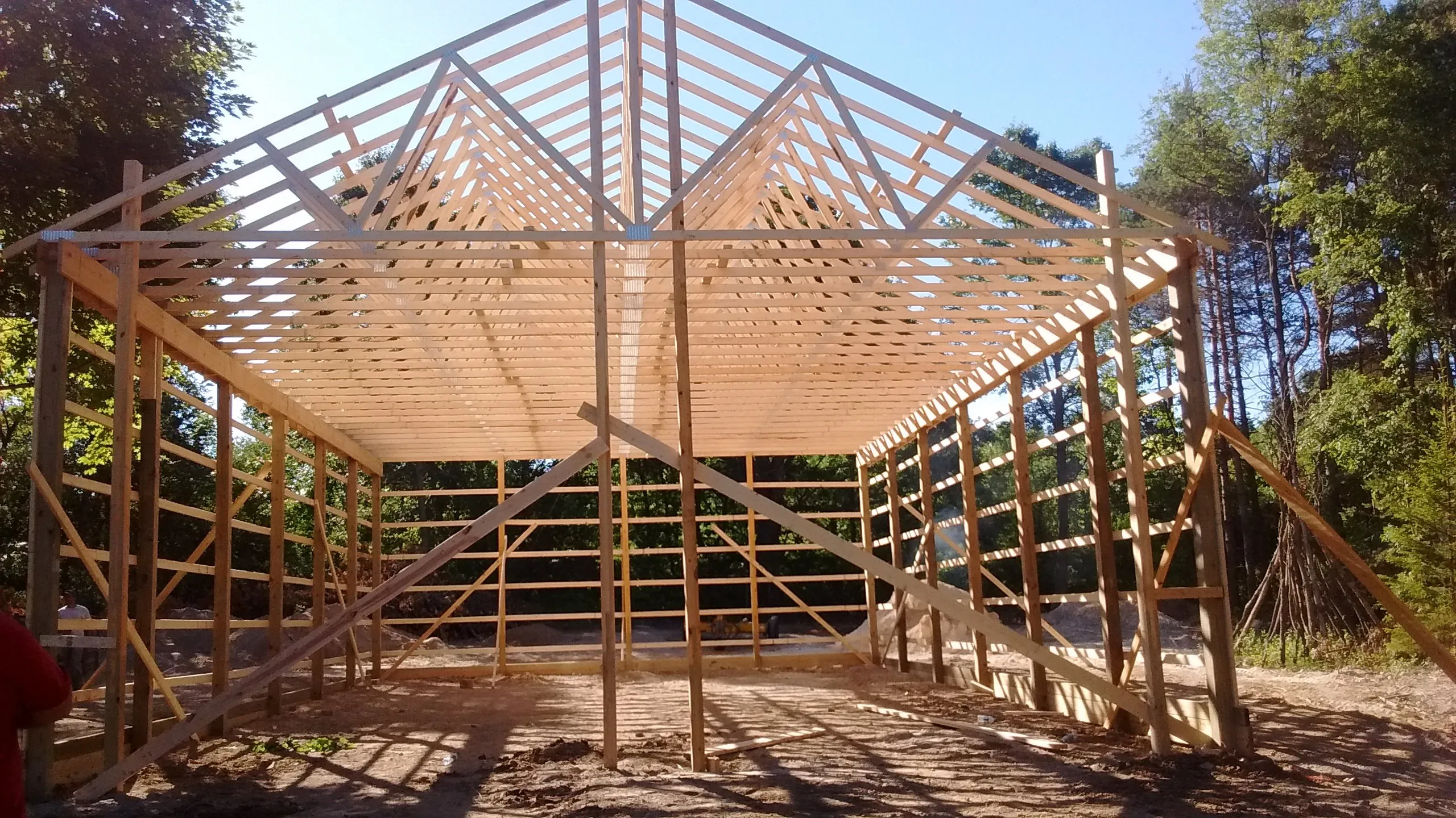 New pole barn construction being built and framed